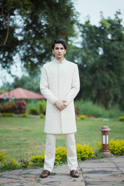 Gold Handcrafted Sherwani Adorned with Pearls, Zari and Zardozi Work