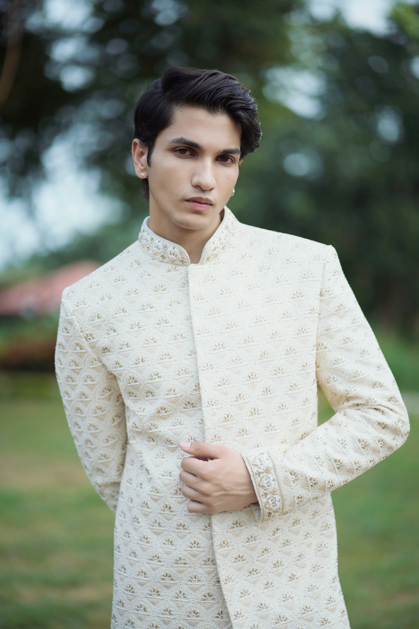Gold Handcrafted Sherwani Adorned with Pearls, Zari and Zardozi Work