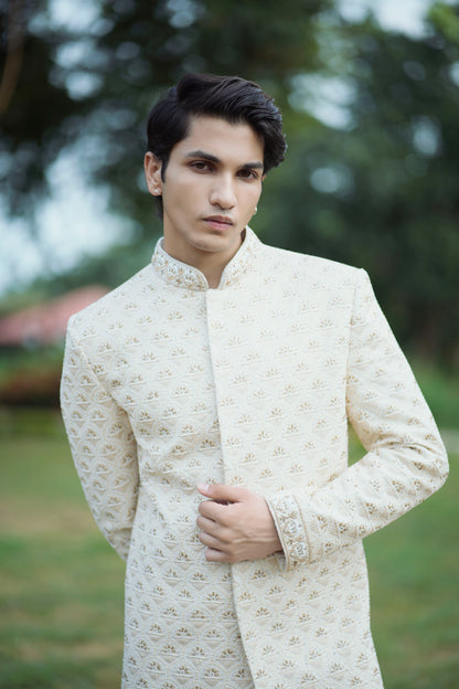 Gold Handcrafted Sherwani Adorned with Pearls, Zari and Zardozi Work