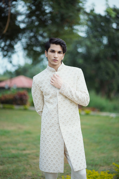 Gold Handcrafted Sherwani Adorned with Pearls, Zari and Zardozi Work