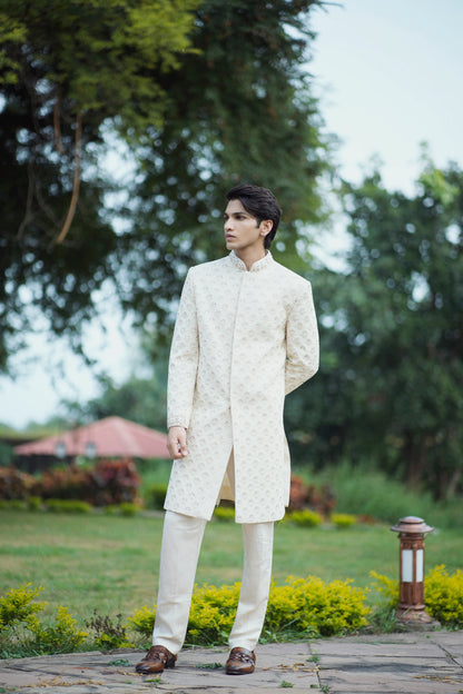 Gold Handcrafted Sherwani Adorned with Pearls, Zari and Zardozi Work