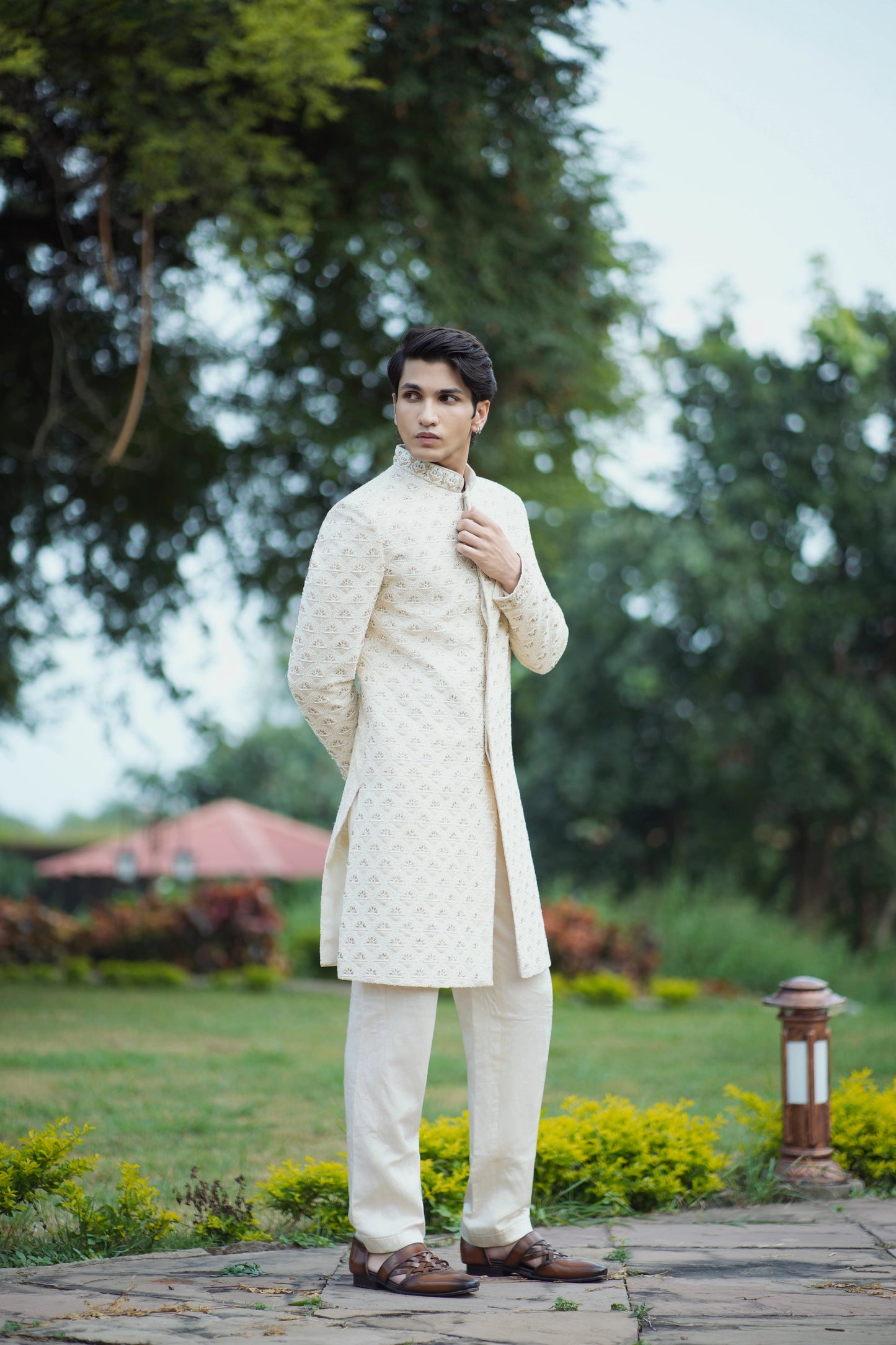 Gold Handcrafted Sherwani Adorned with Pearls, Zari and Zardozi Work