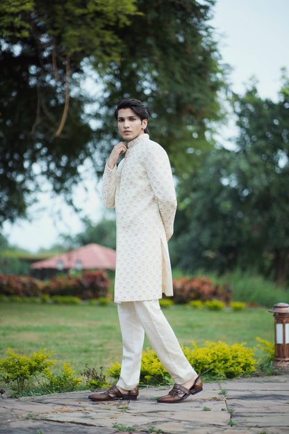 Gold Handcrafted Sherwani Adorned with Pearls, Zari and Zardozi Work