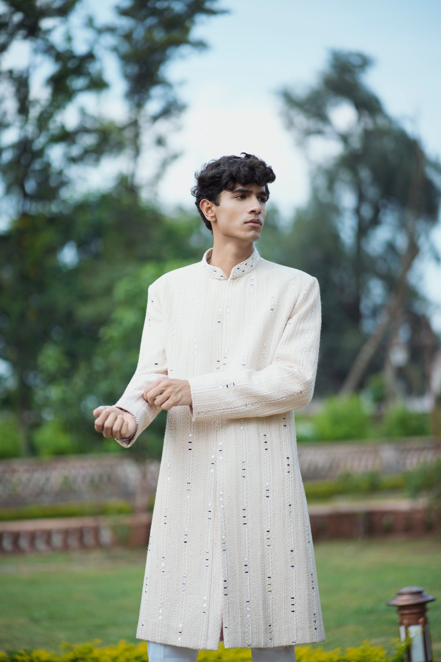 Rose Gold Sherwani with Mirror, Pearl, and Sequin Embellishments